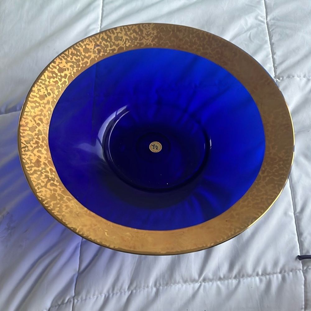 blue glass bowl with gold trimming